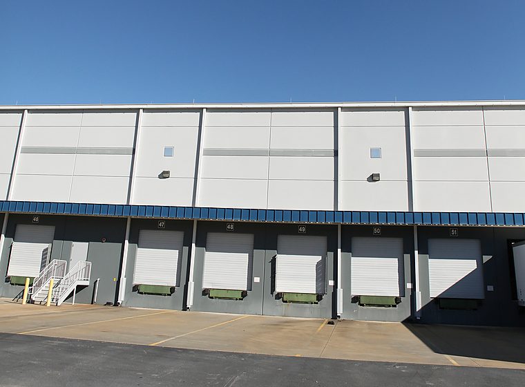Numbered loading dock doors at a distribution warehouse
