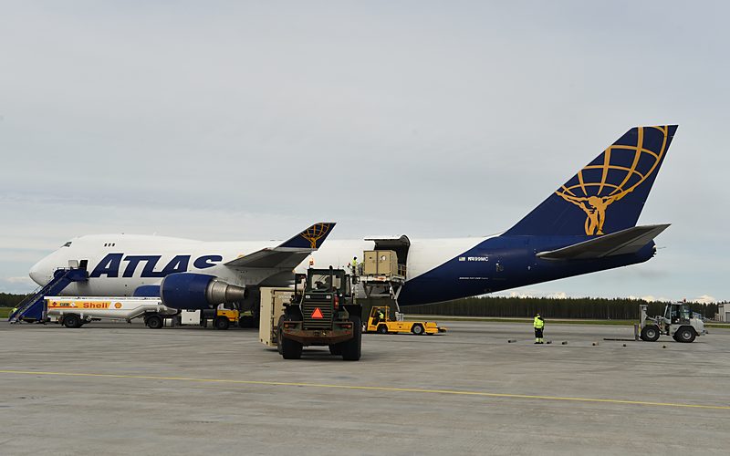 A Boeing 747 freighter being loaded with cargo on the apron